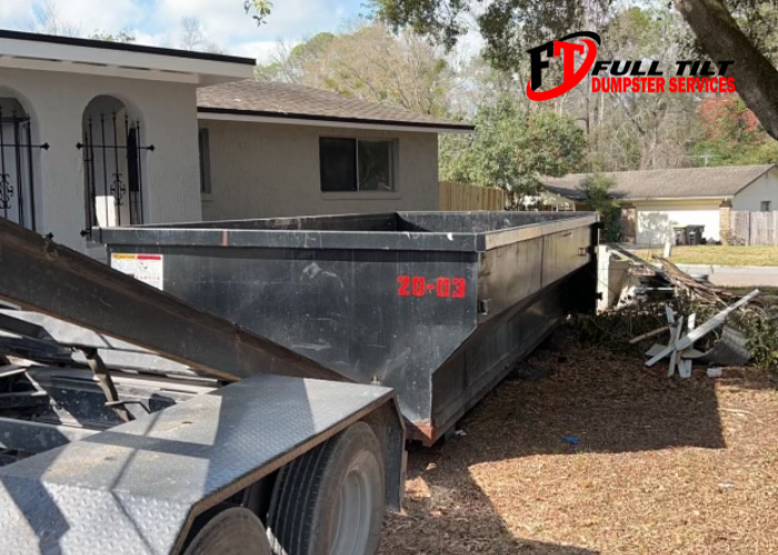 dumpster rental in somones yard in Macclenny, FL